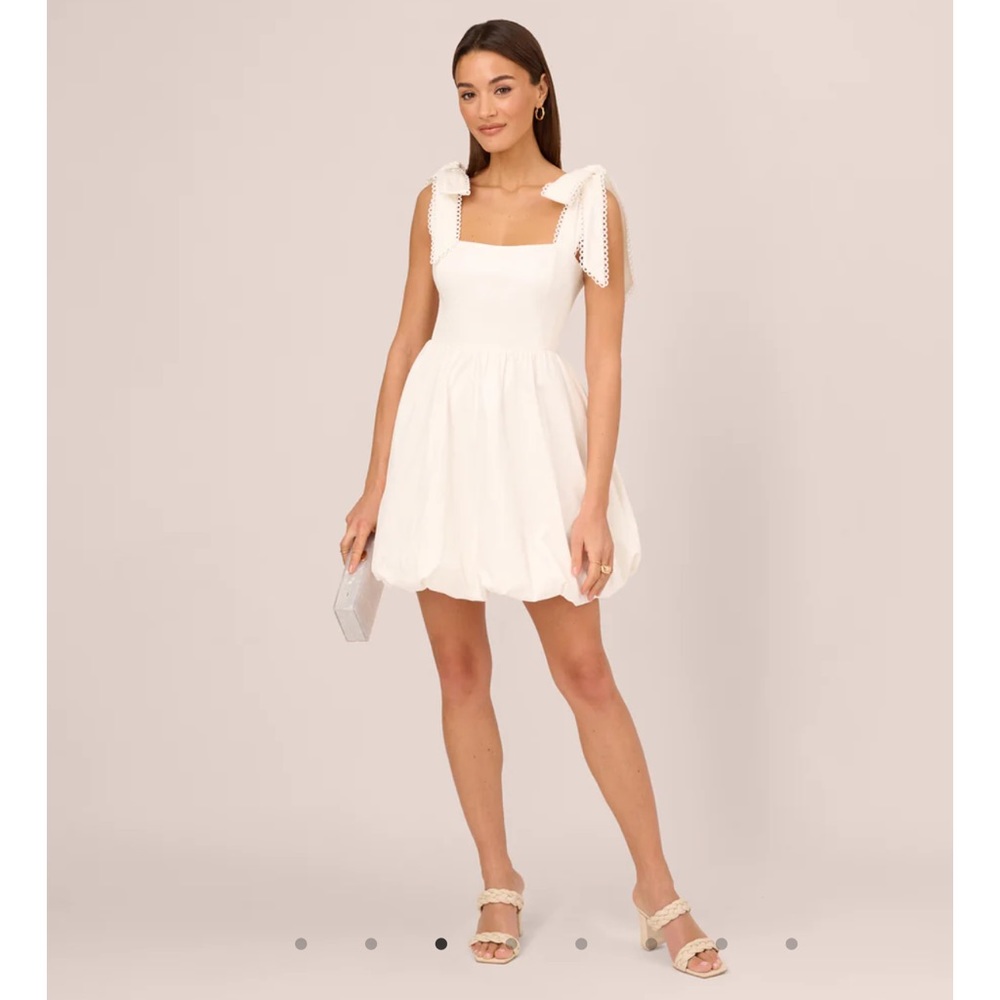 ADRIANNA PAPELL
SHORT BUBBLE DRESS WITH BOW TIE STRAPS IN WHITE size 10 NWT
